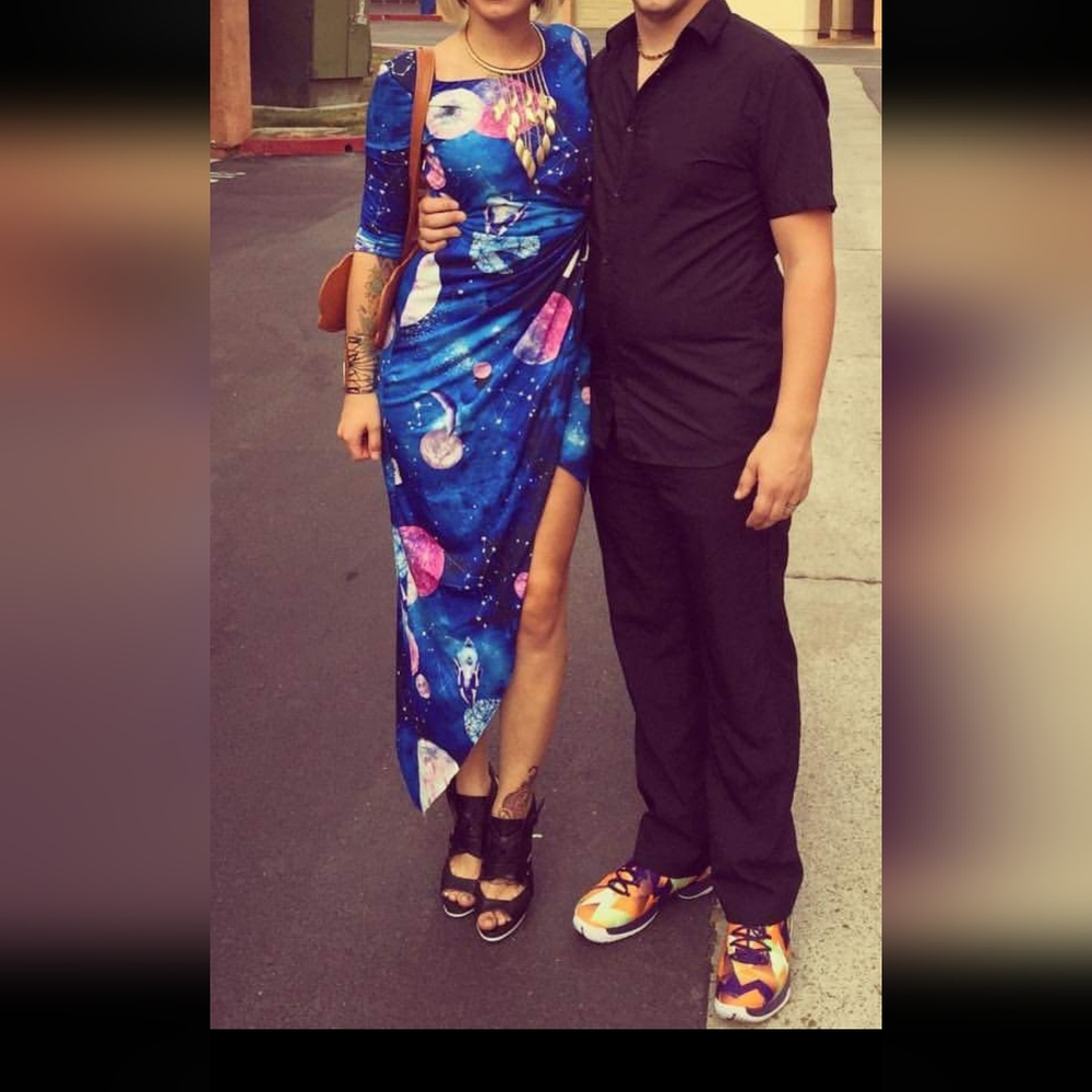 Asymmetrical wrap space print dress